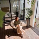 Woman sitting in chair